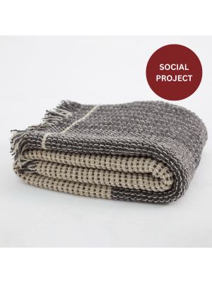 Buy Teixidors Time plaid online at Amanvida - Beautiful blanket of Mulesing-free Merino wool, crafted by hand in a socially engaged studio in Barcelona. 